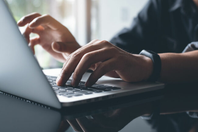 Person working on a laptop