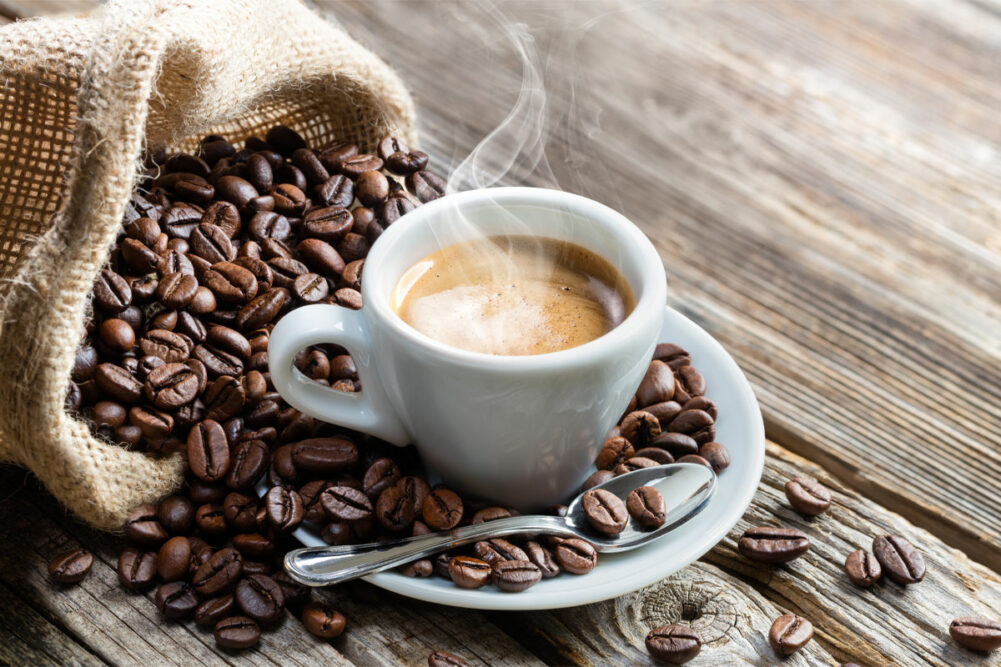 Espresso coffee cup with coffee beans