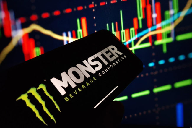 Monster Beverage Corp. logo on a smartphone