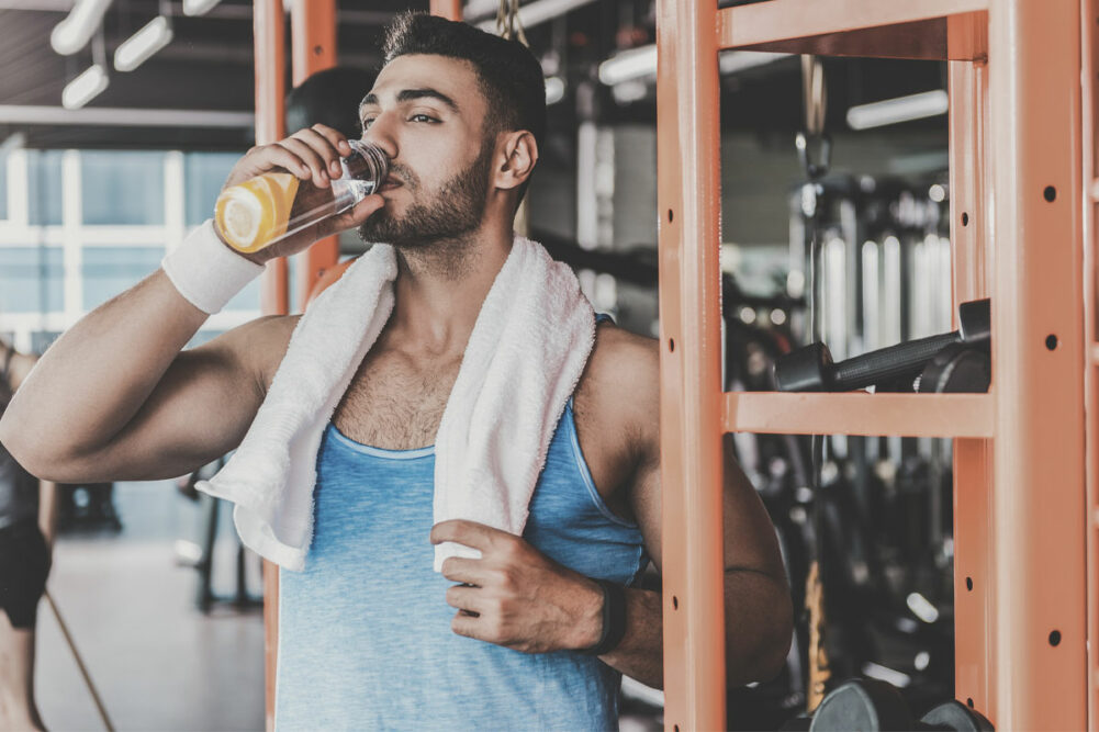 Man drinking sports beverage