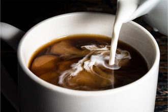 Coffee creamer being poured