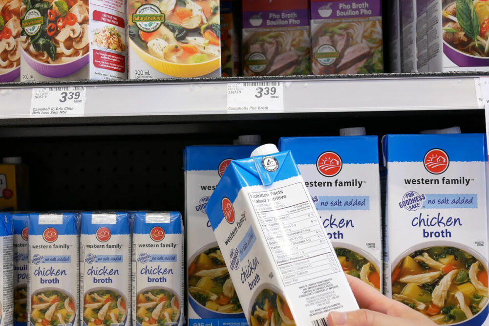 Chicken broth on a grocery shelf