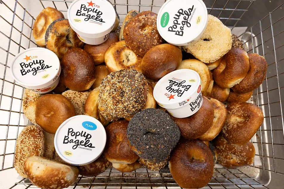 https://www.foodbusinessnews.net/ext/resources/2025/07/29/PopUp-Bagels_bagels-with-schmear_credit-Jen-Goldberg-PopUp-Bagels.webp?height=635&t=1753798497&width=1200