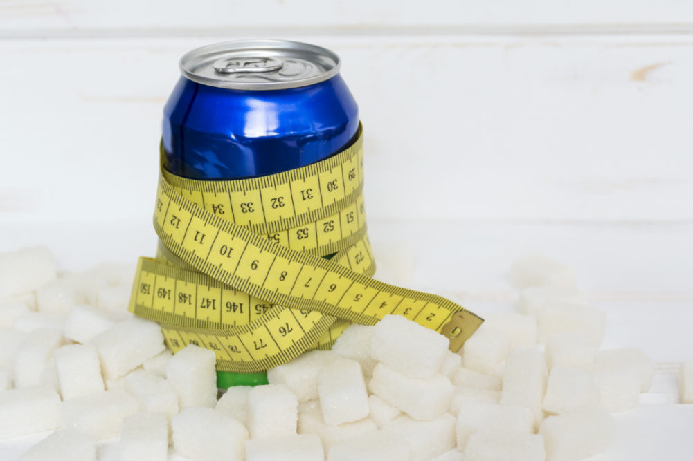 Sugary soda with measurement tape